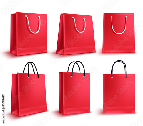 Shopping bags vector set. Red sale empty paper bags collection for fashion shopping design elements isolated in white. Vector illustration.