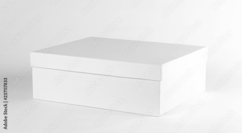 Empty clean box. Shoe box. Close up. Isolated on white background Empty clean box. Shoe box. Close up. Isolated on white background