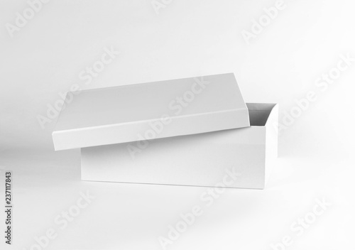 Empty clean box. Shoe box. Close up. Isolated on white background photo