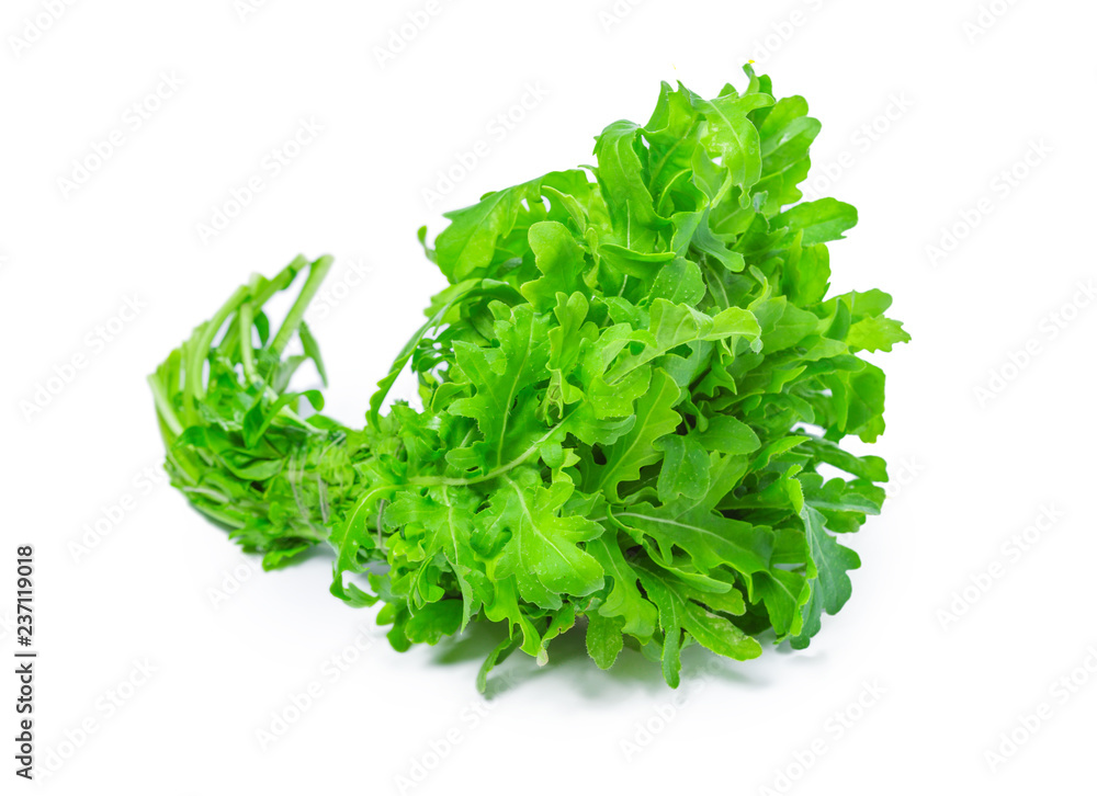 Obraz premium rucola or arugula, heap, salad leaves, isolated on white background