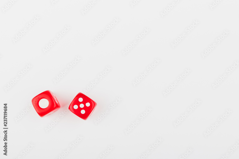 Pair of red dice on the light background Pair of red dice on the light background