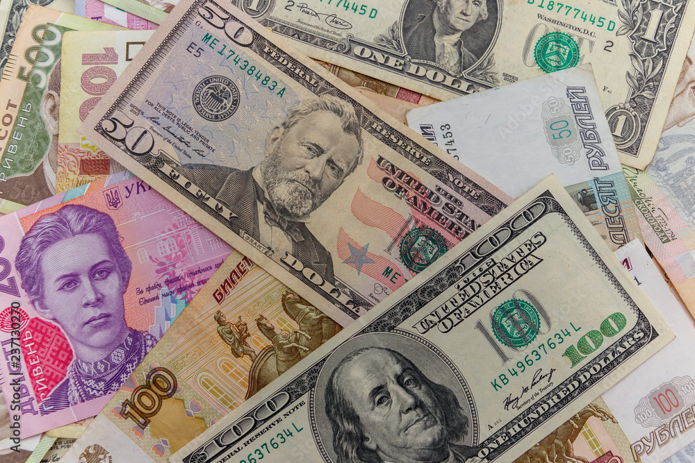Multicurrency background of the us dollars, russian rubles and ukrainian hryvnias Multicurrency background of the us dollars, russian rubles and ukrainian hryvnias