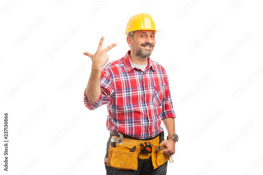 Builder holding three fingers up .