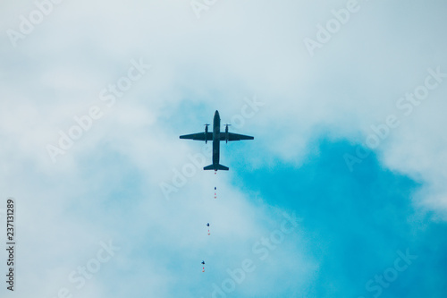 Military parachutist on the background. Rangers parachuted from airplanes.