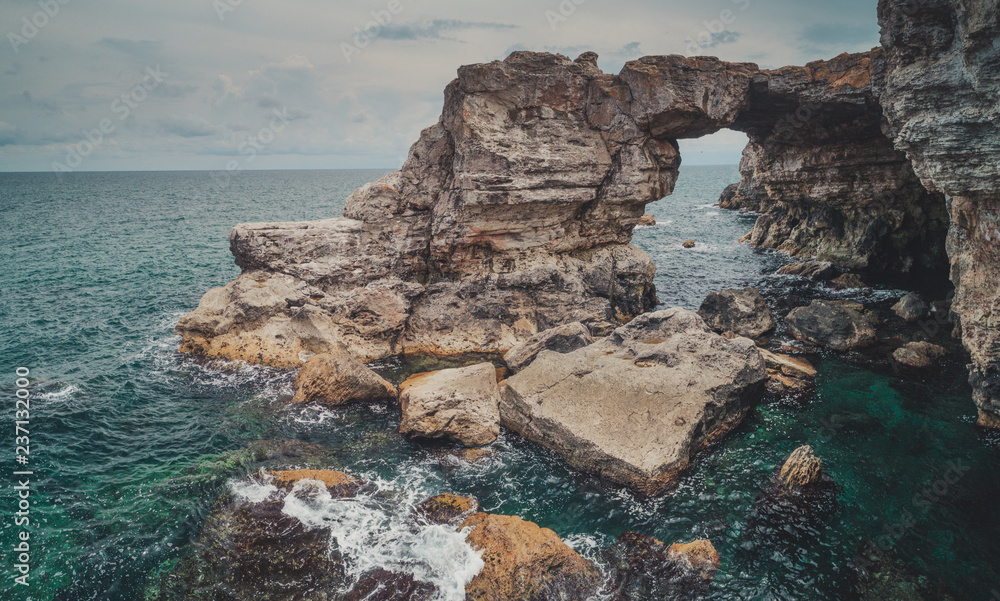 The rock formation Arch in the sea near Tyulenovo, Bulgaria, Europe .