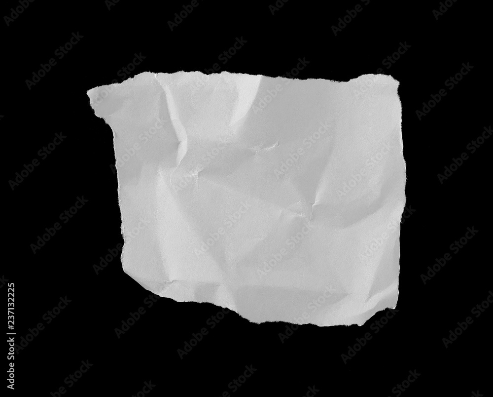 Crumpled white paper scraps isolated on black background Crumpled white paper scraps isolated on black background