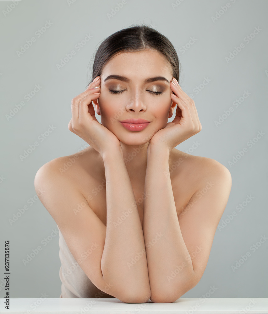 Young woman face. Perfect girl with healthy skin Young woman face. Perfect girl with healthy skin