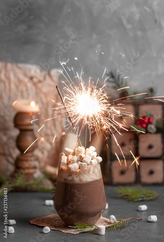 Christmas cocoa with marshmallows and sparklers.