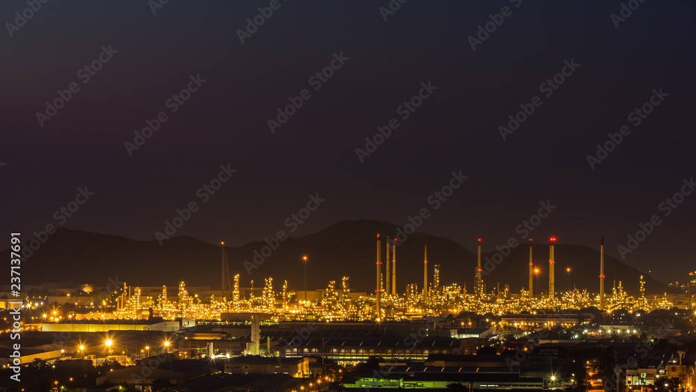 The Oil refinery power station at night time 