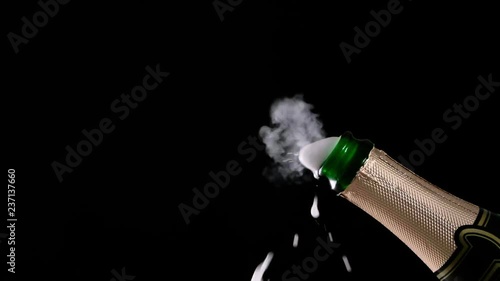 HD - Champagne bottle explosion with cork popping splash