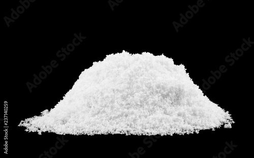 white snow pile isolated on black background