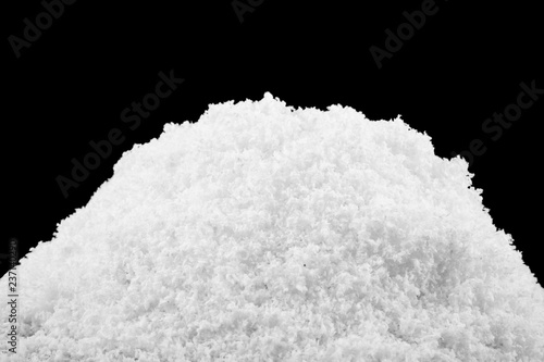 white snow pile isolated on black background