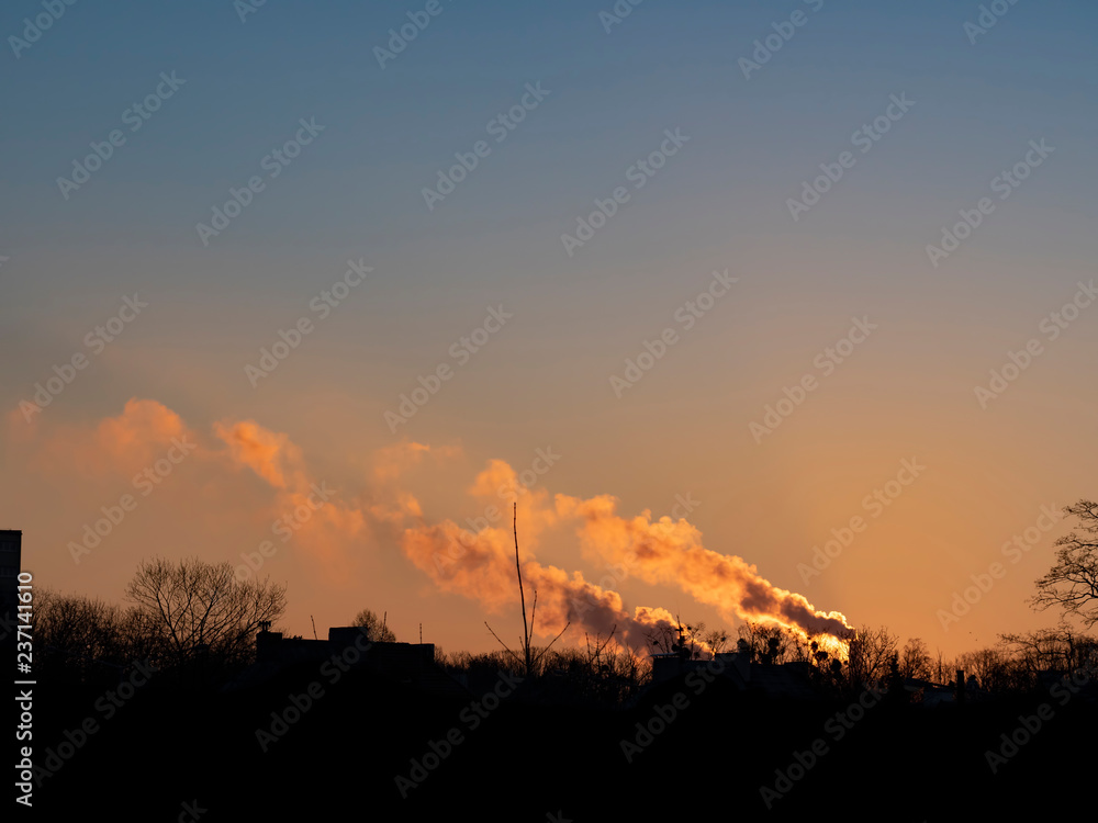 Winter morning smoke out from big chimney