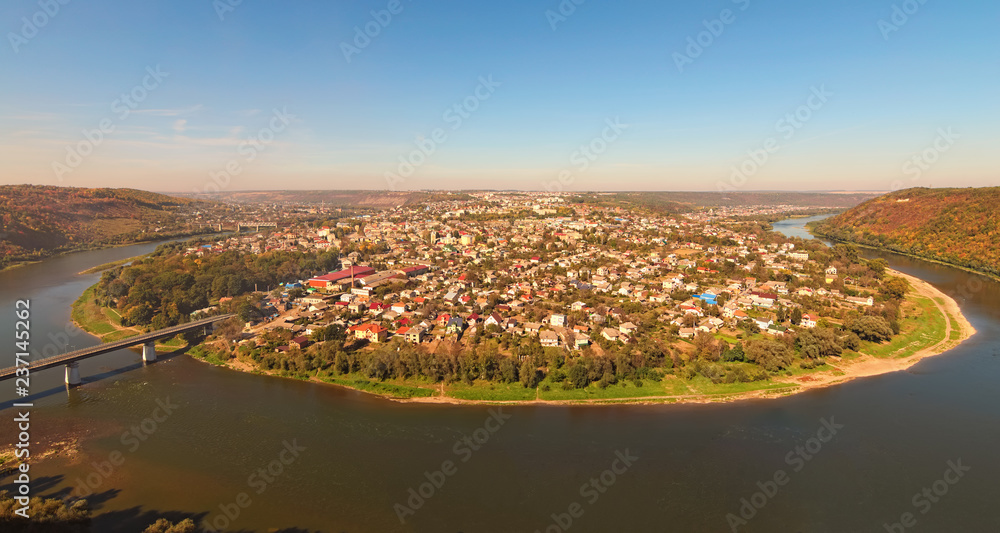 Scenic panorama of Zalishchyky town and the Dniester River. View from viewpoint in Khreshchatyk village, Ternopil region, Ukraine