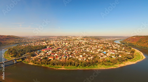 Autumn landscape panorama of the Zalishchyky town and canyon with Dnister River. Ternopil region, Ukraine photo