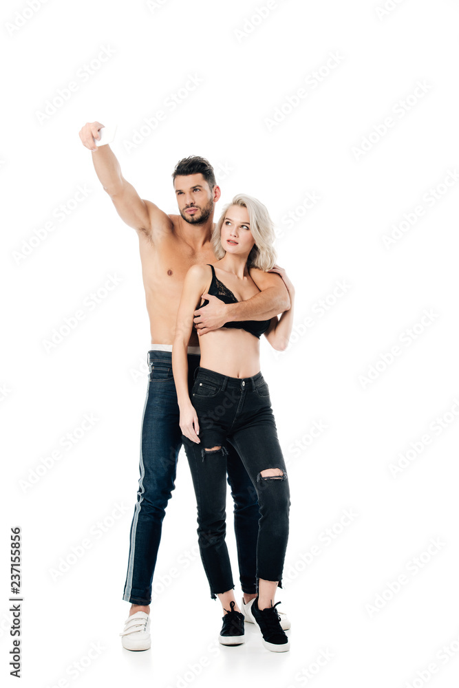 beautiful sexy couple taking selfie on smartphone isolated on white Stock  Photo | Adobe Stock