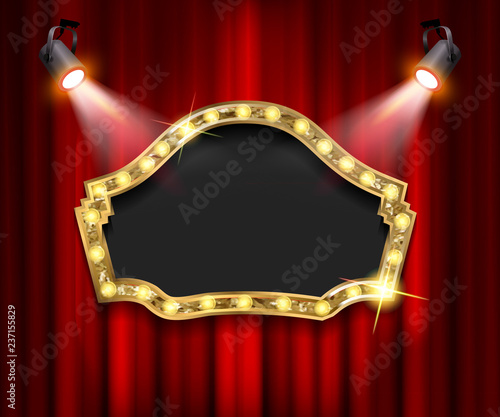 Theater sign on curtain with spotlight.