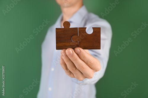 Man with pieces of wooden p...