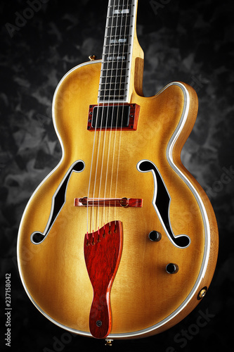 golden custom made jazz guitar photo