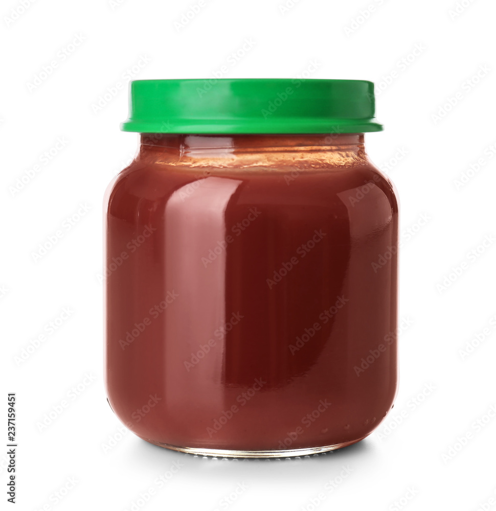 Glass jar with healthy baby food on white background Glass jar with healthy baby food on white background