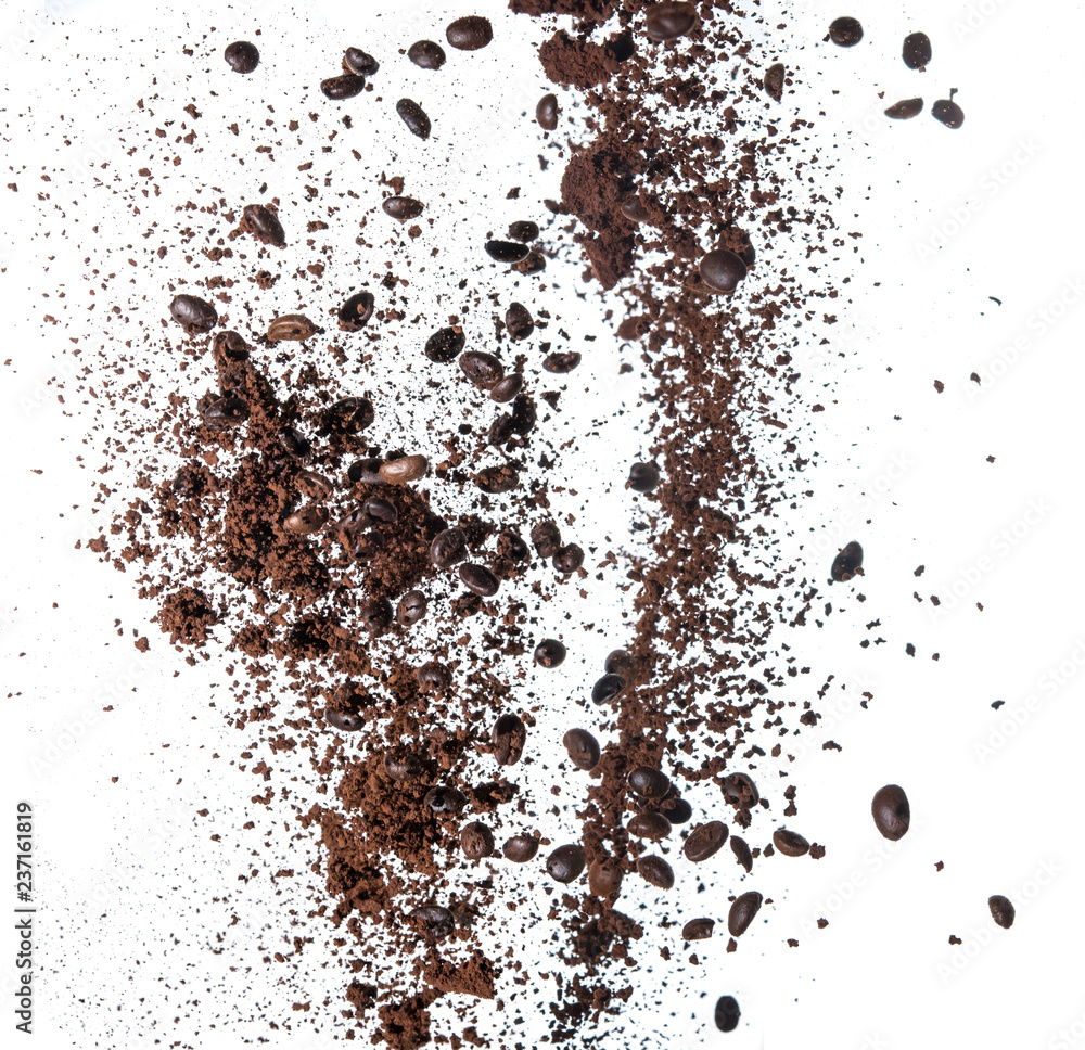 Coffee powder and coffee beans splash or explosion flying in the air