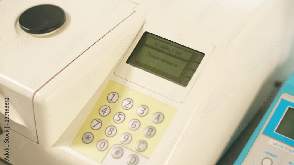 Scientific instrument for researchers is in biochemical laboratory. Spectrophotometer Scientific instrument for researchers is in biochemical laboratory. Spectrophotometer