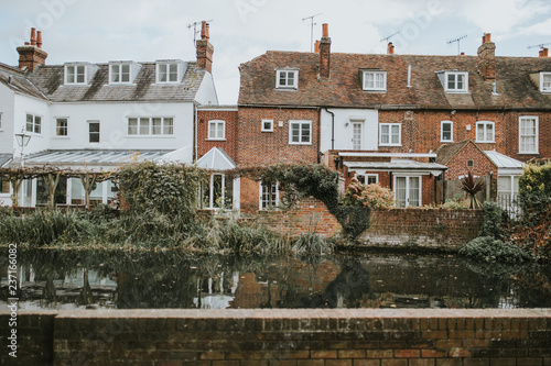 Houses  in front of Stour River, in the channels of Canterbury Village, England.