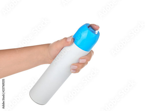 Female hand with air freshener on white background