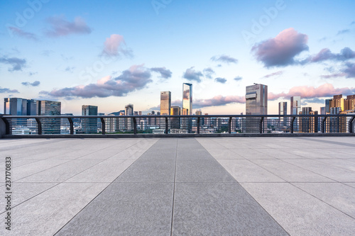 city skyline with empty square in urban