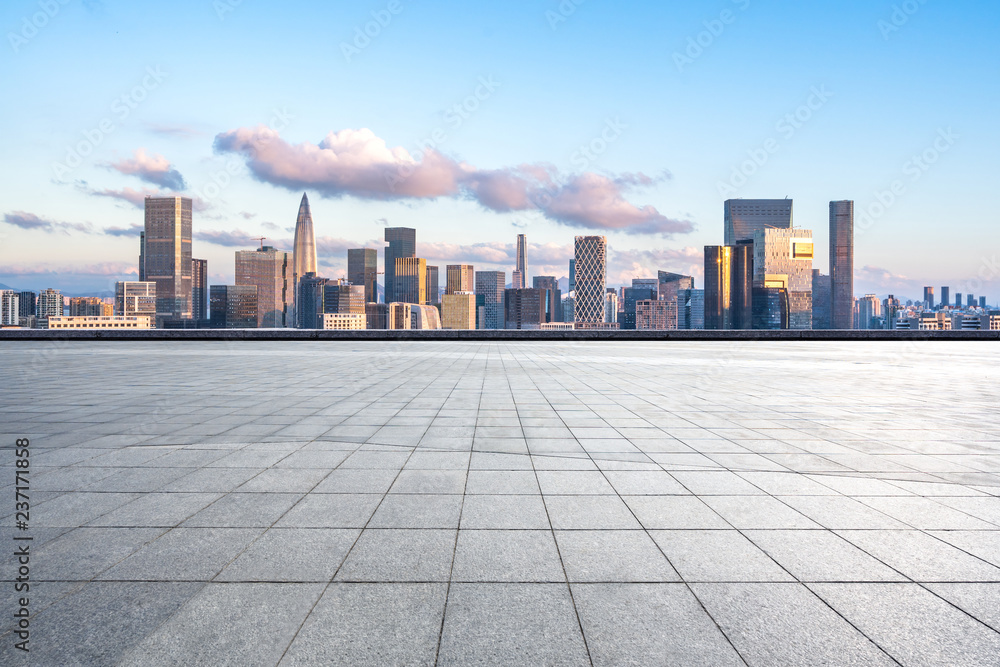 city skyline with empty square in urban