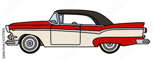 The old red and white american car
