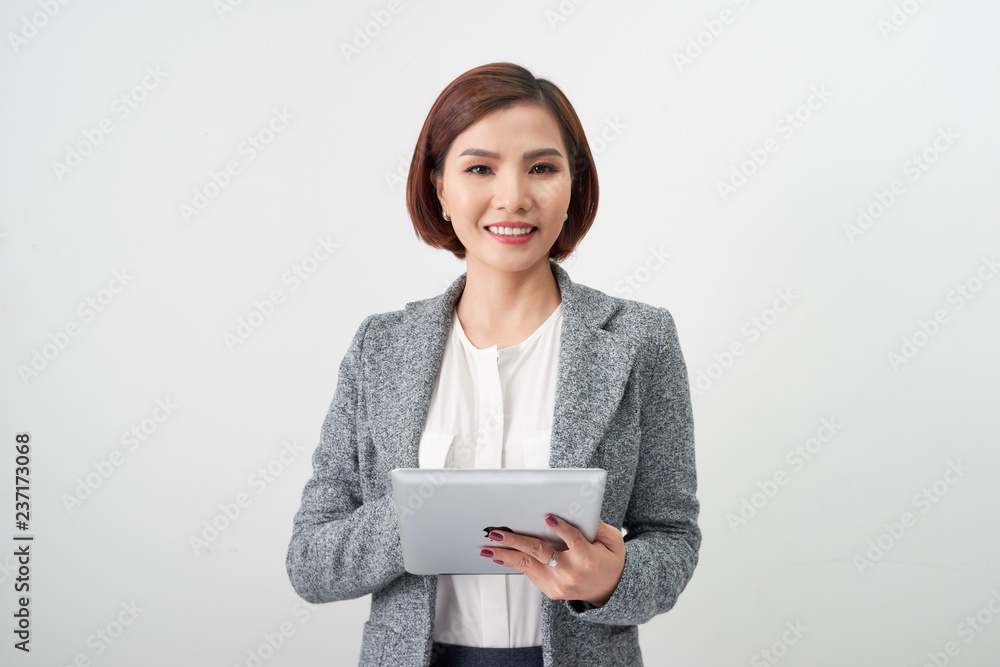 young business woman with digital tablet in office lobby young business woman with digital tablet in office lobby