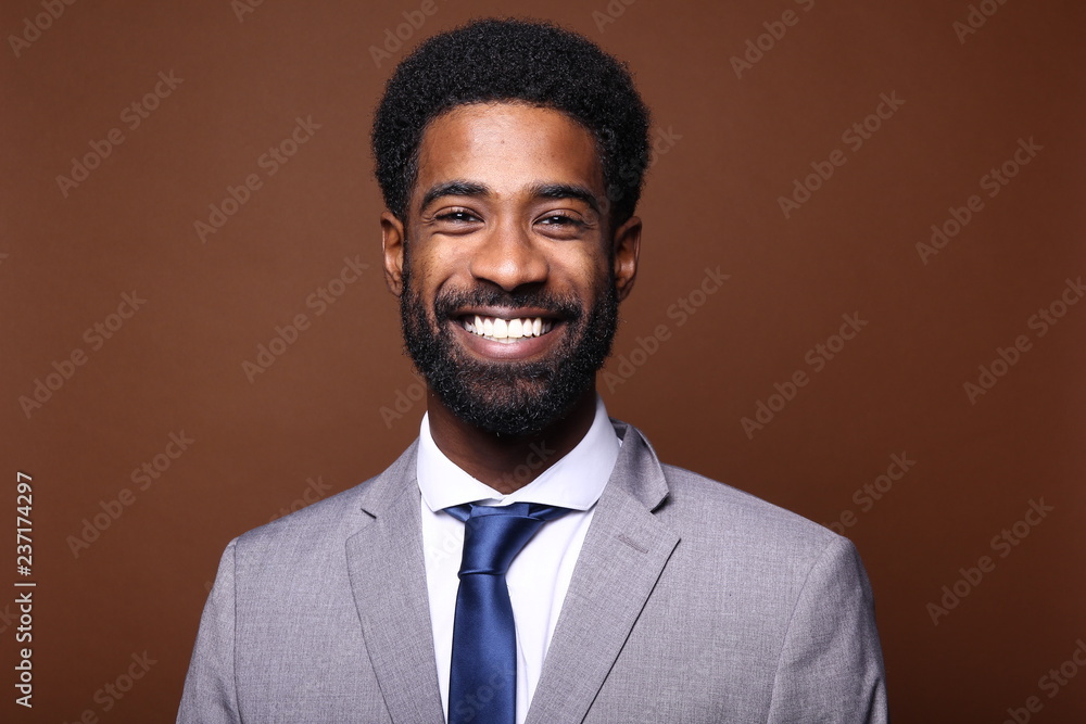 Beautiful black man in front of a colored background Beautiful black man in front of a colored background