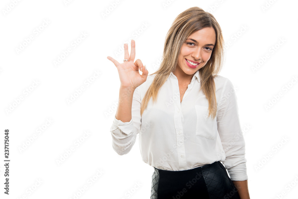 Young pretty business woman showing ok gesture Young pretty business woman showing ok gesture