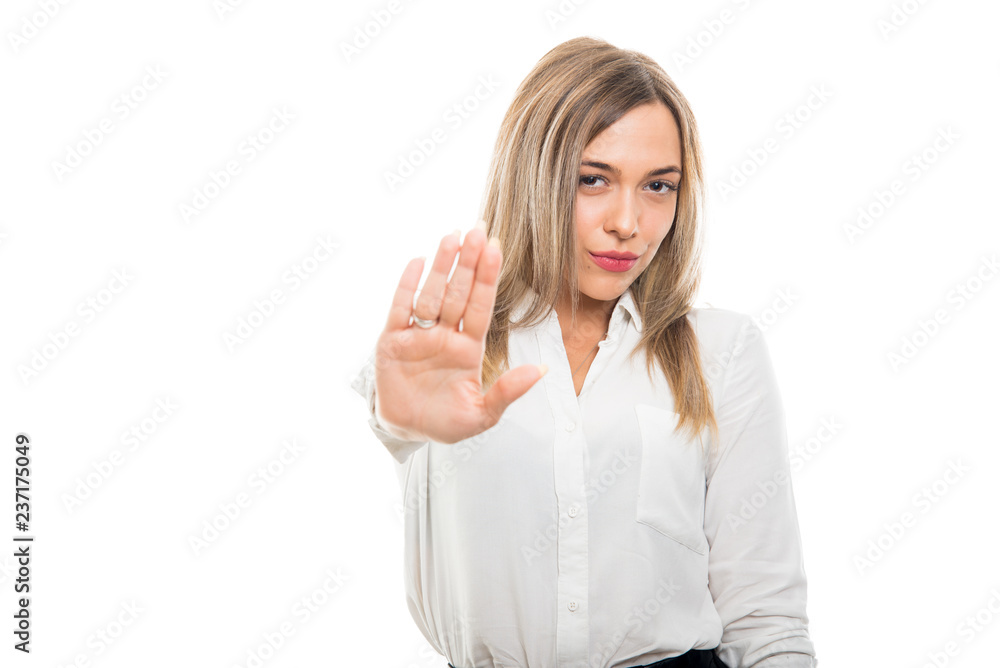 Young pretty business woman showing stop gesture Young pretty business woman showing stop gesture