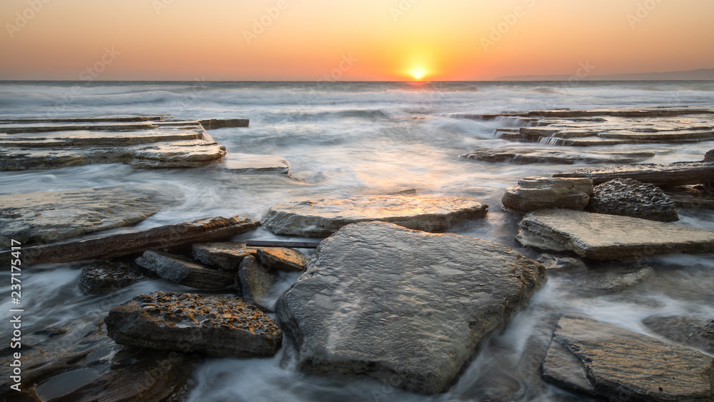 Sunset at rocky shore, Cyprus