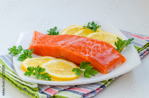 piece of raw salmon on a plate