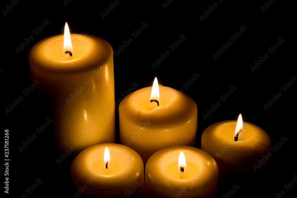 Burning candle in darkness Burning candle in darkness