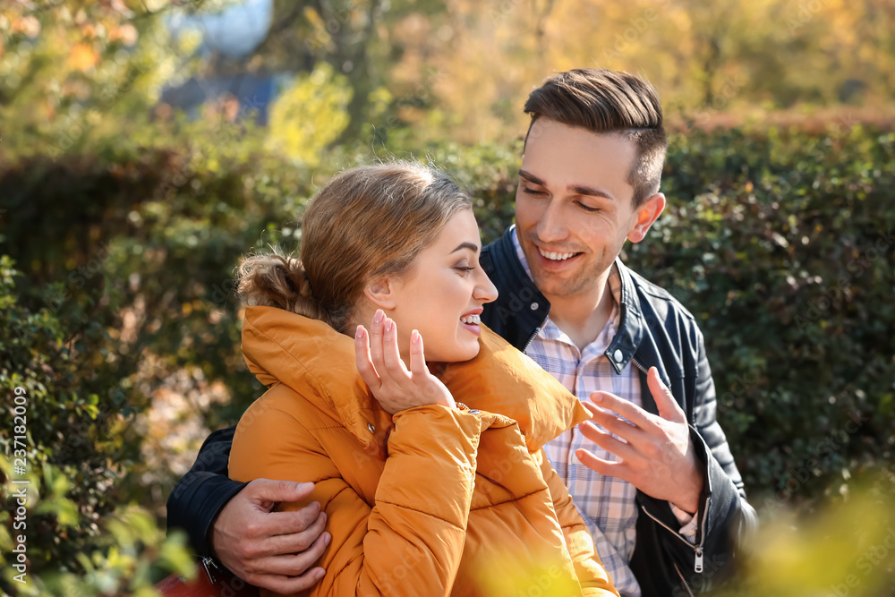 Loving young couple in autumn park Loving young couple in autumn park