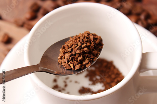  Put instant coffee in a cup. Flavored coffee