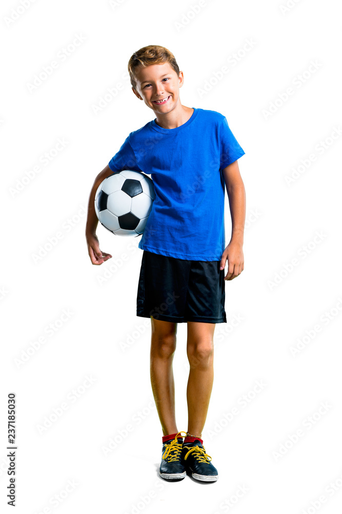 A full-length shot of Boy playing soccer on isolated white background A full-length shot of Boy playing soccer on isolated white background