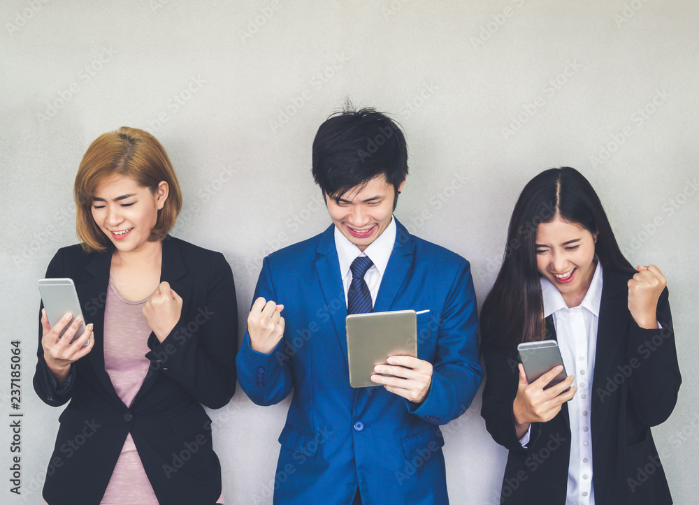 Group of young business people using mobile phones to communication for work successful and happy. network concept. Group of young business people using mobile phones to communication for work successful and happy. network concept.