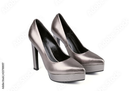 Silver woman shoes with high heels on white background
