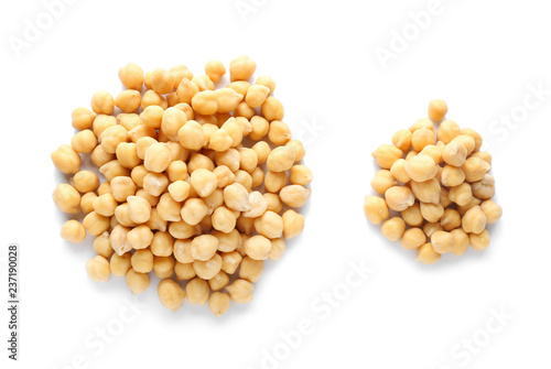 Heaps of chickpeas on white background