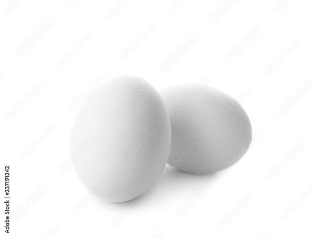 Raw chicken eggs on white background