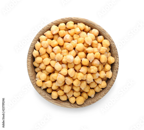Bowl with chickpeas on white background photo