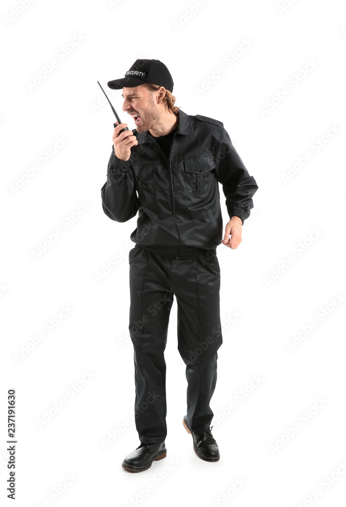 Male security guard with portable radio transmitter on white background Male security guard with portable radio transmitter on white background