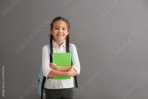Cute girl with backpack and...
