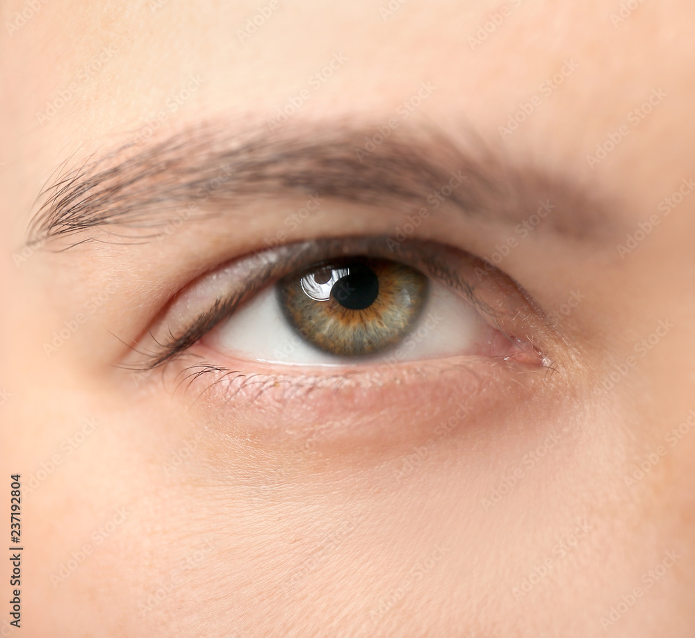 Young woman with beautiful eyes, closeup Young woman with beautiful eyes, closeup