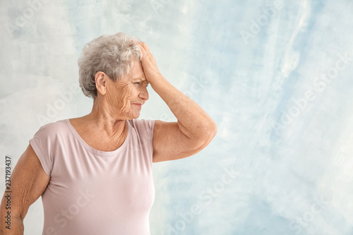 Portrait of elderly woman a...